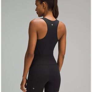 Wunder Train Racerback Tank Top
Medium Support, B/C Cups; size 8; black